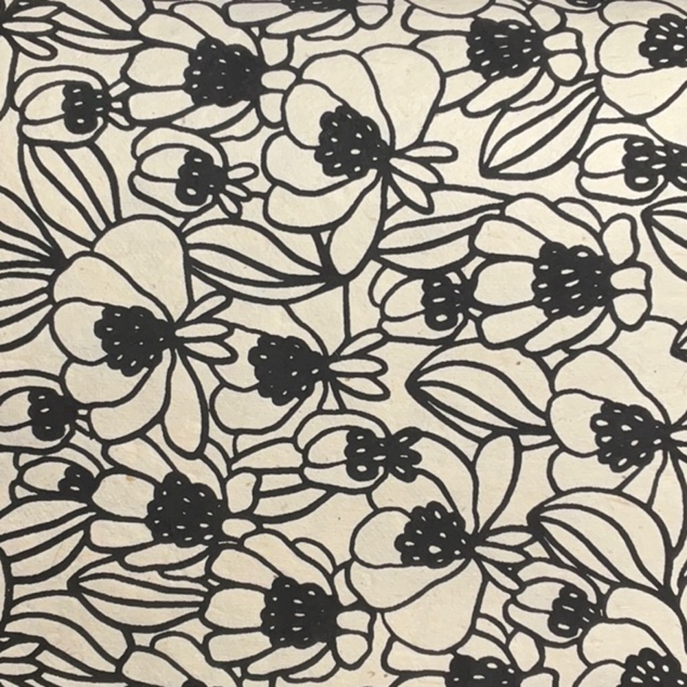 Pre-order today! Black floral on cream background. Hand Sewn Artist Journal.